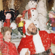 Image for article titled 70 Years of First Ladies Standing in Front of Christmas Trees